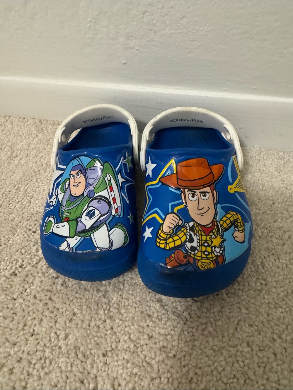 CROCS Kids Blue Clogs with Buzz Lightyear & Woody Graphics